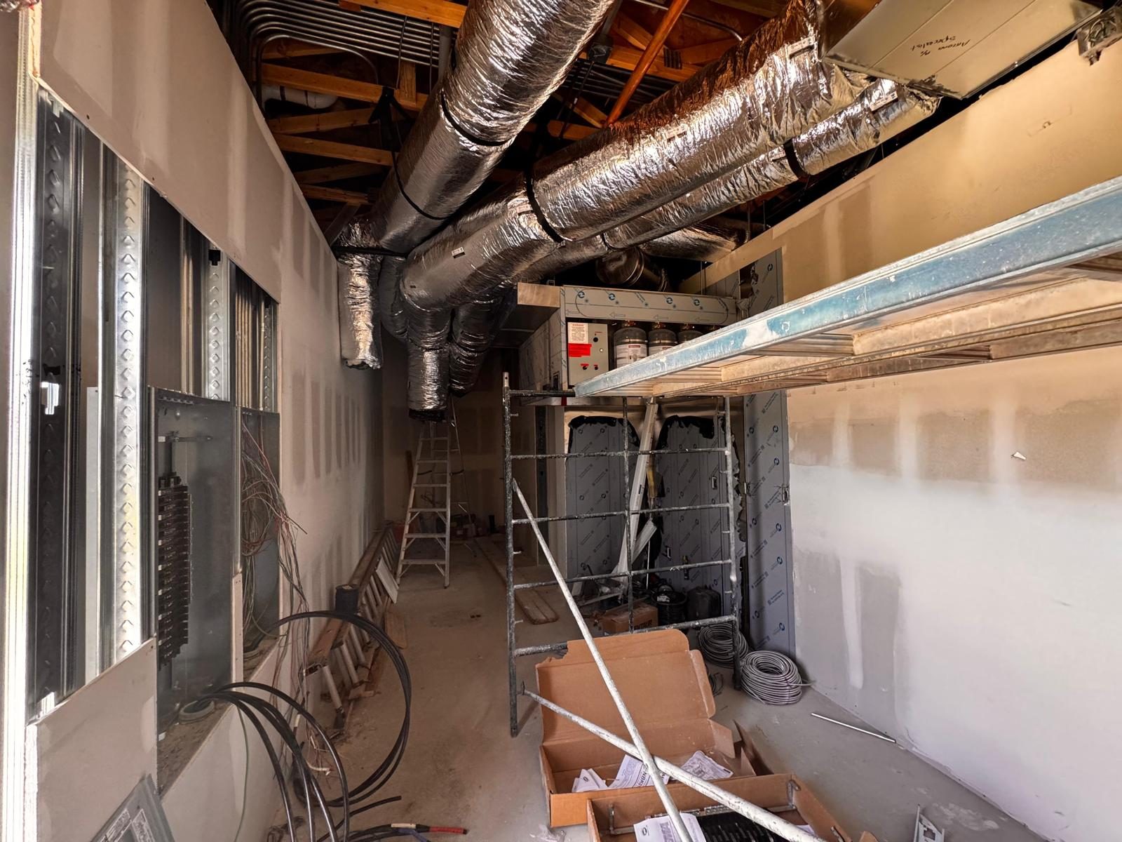 Hood fire-suppression system, electrical panel and duct run