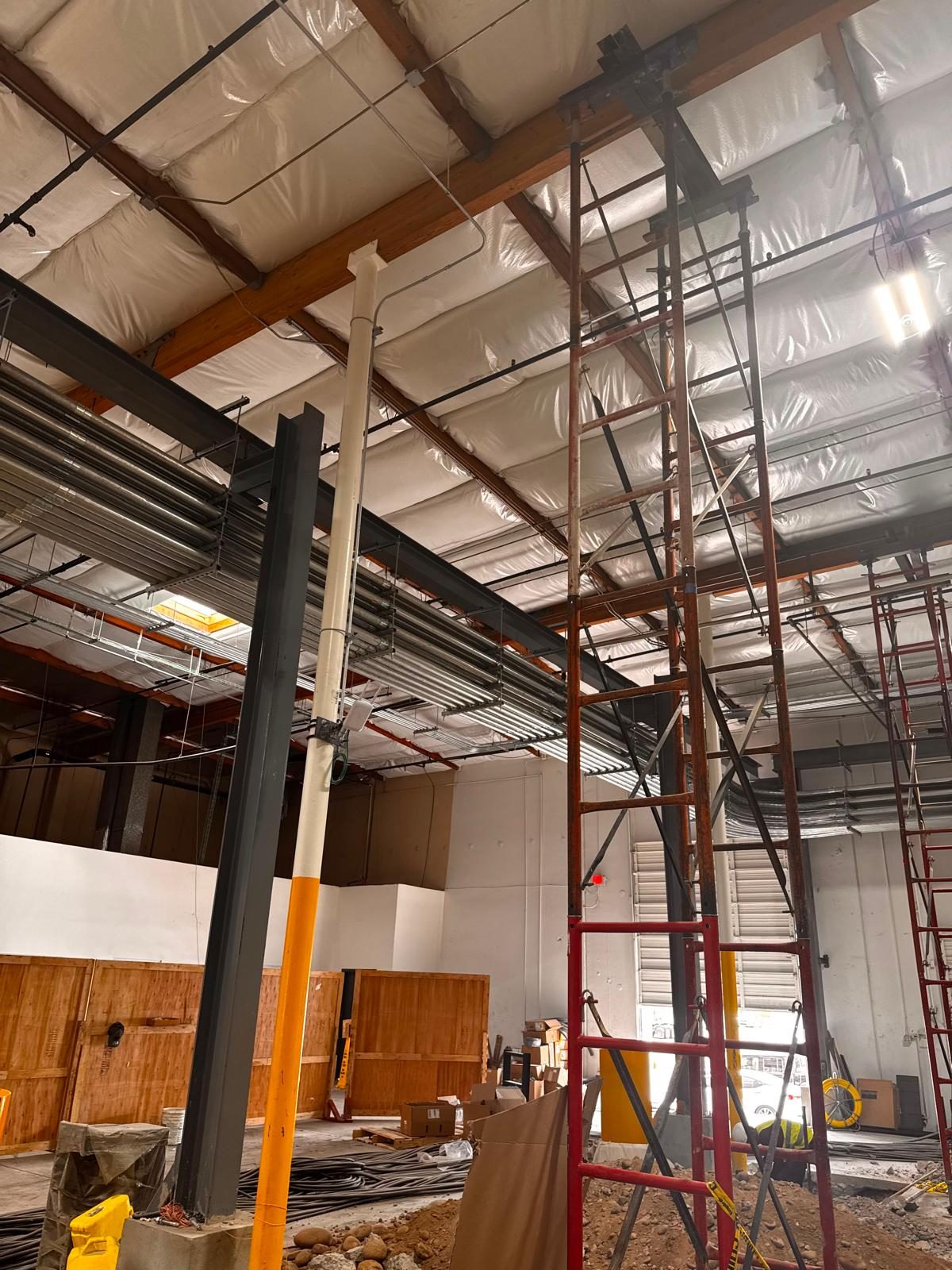 Pad excavation at a steel column, cable tray and runway steel overhead