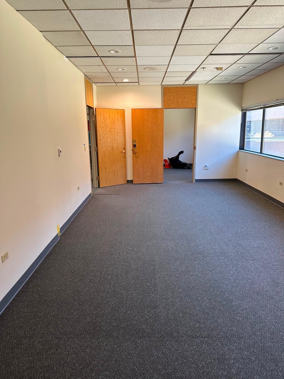 Open office looking toward the entry doors