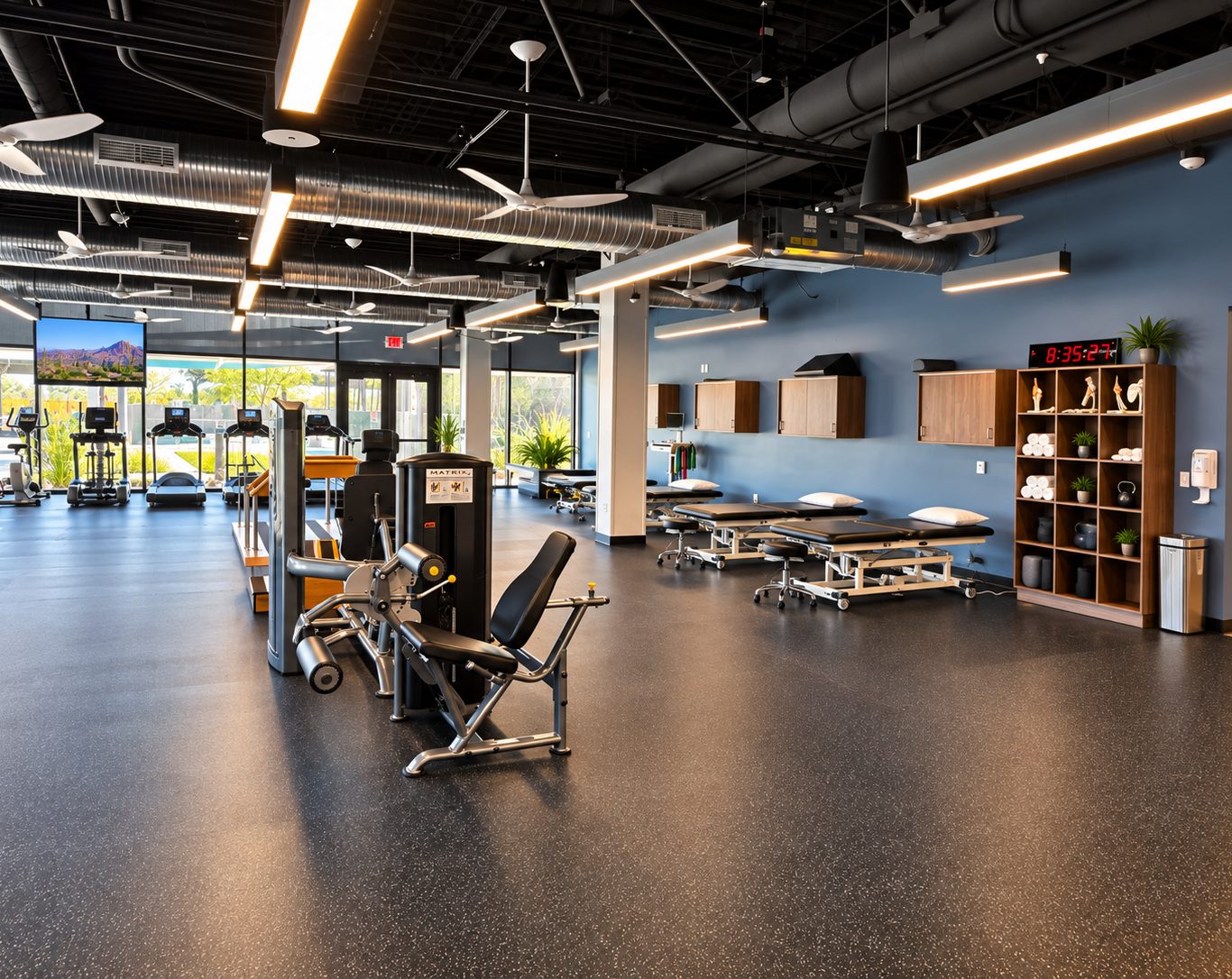 Treatment area with cubby shelving, casework and a pace clock